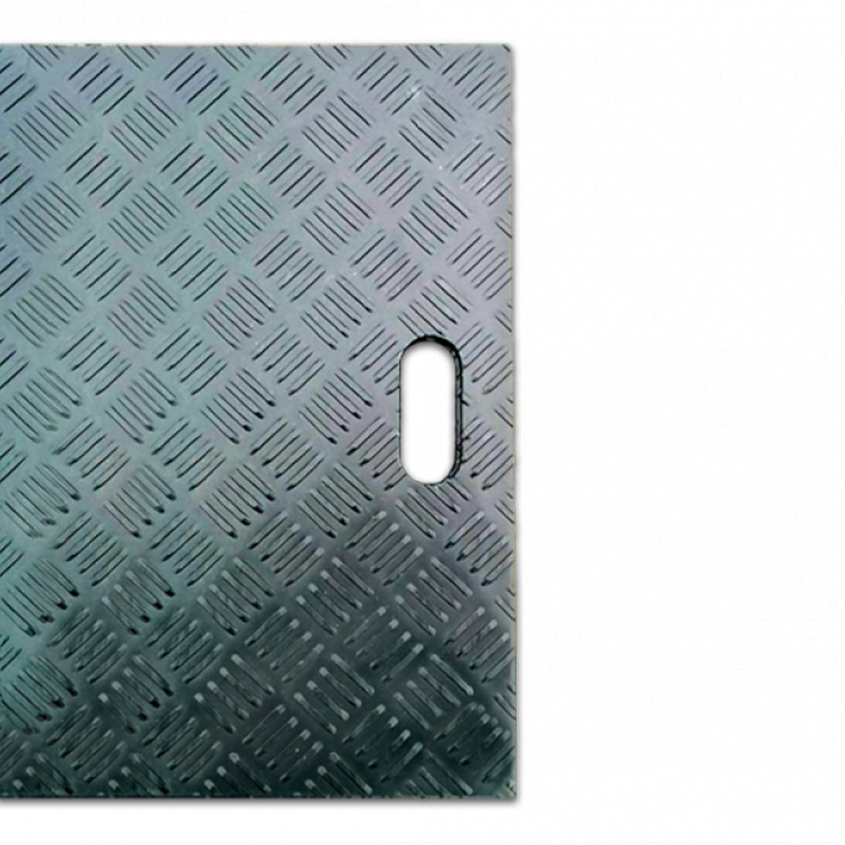 Close-up of diamond-tread ground protection mat surface and handle slot