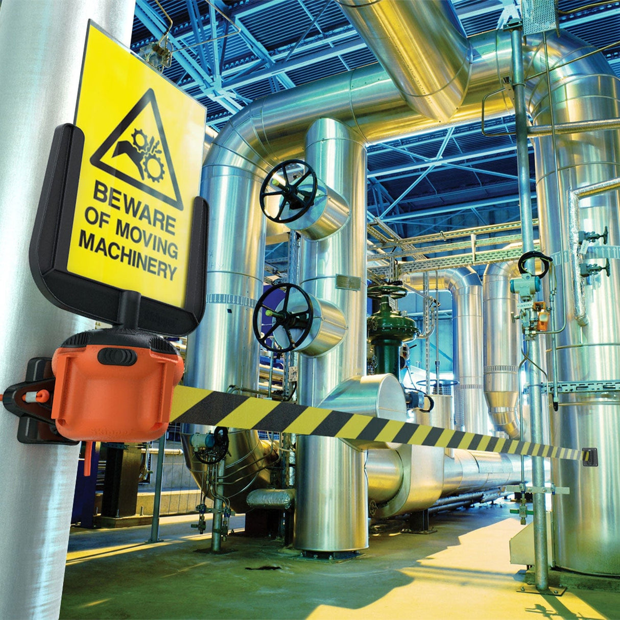 Skipper A4 sign holder displaying a Beware of Moving Machinery warning sign across an industrial aisle