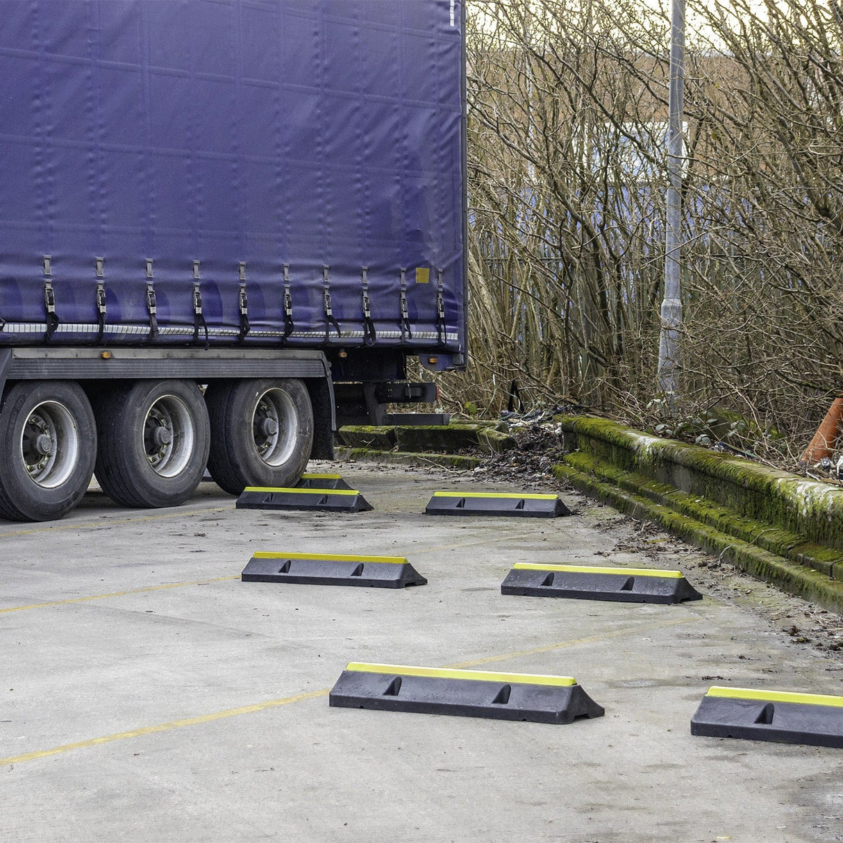 Truck parking-articulated-waiting-bays-warehouses-heavy-vehicles-commercial-seaports-loading-areas-lorry-service-stations-distribution-hubs-depots-service-areas-ferry-ports-industrial-truck-stoppers-concrete-wheel-stops-car-stops-lorry-wheel-blocks