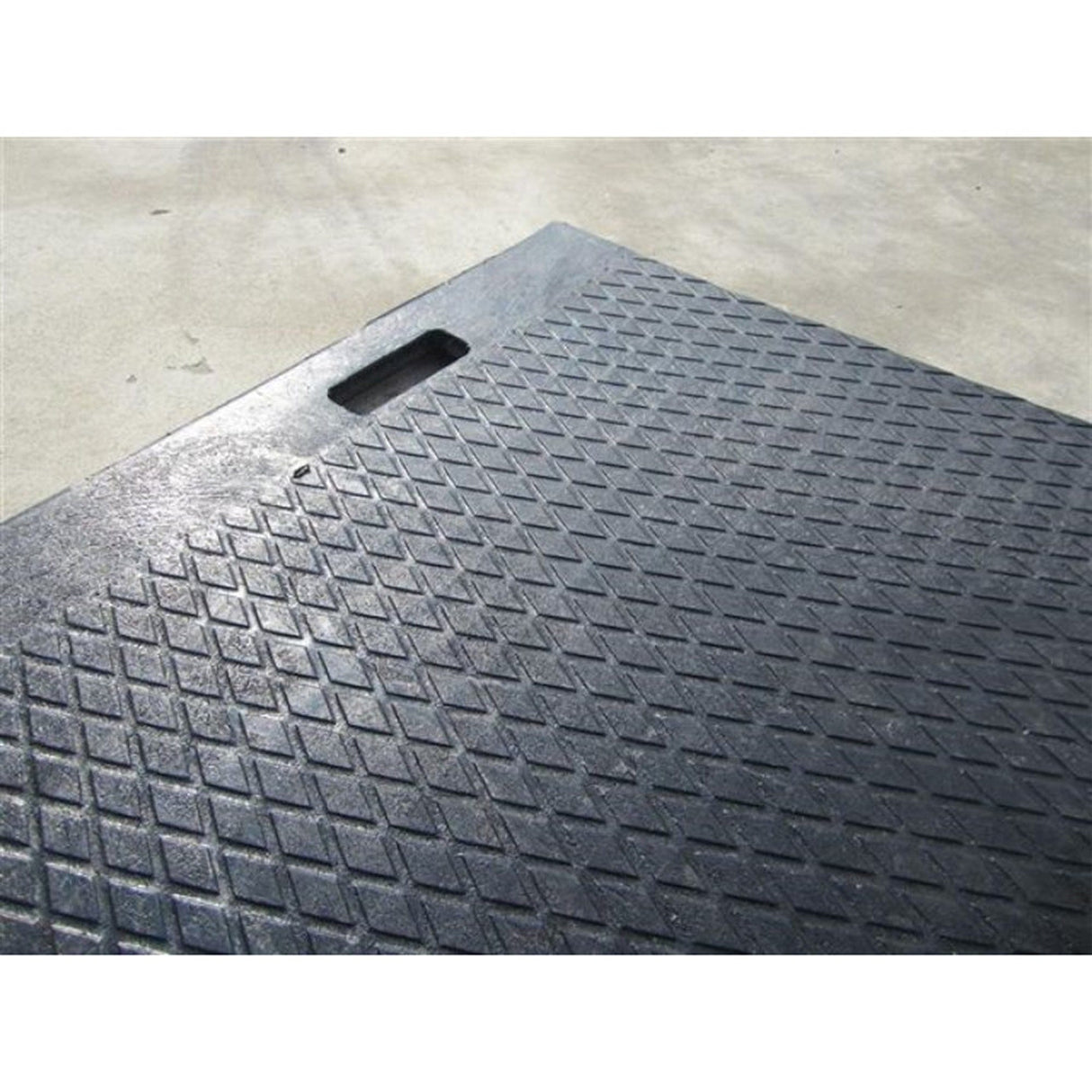 EuroTrak access mat - close-up of hand hole and diamond-pattern surface texture