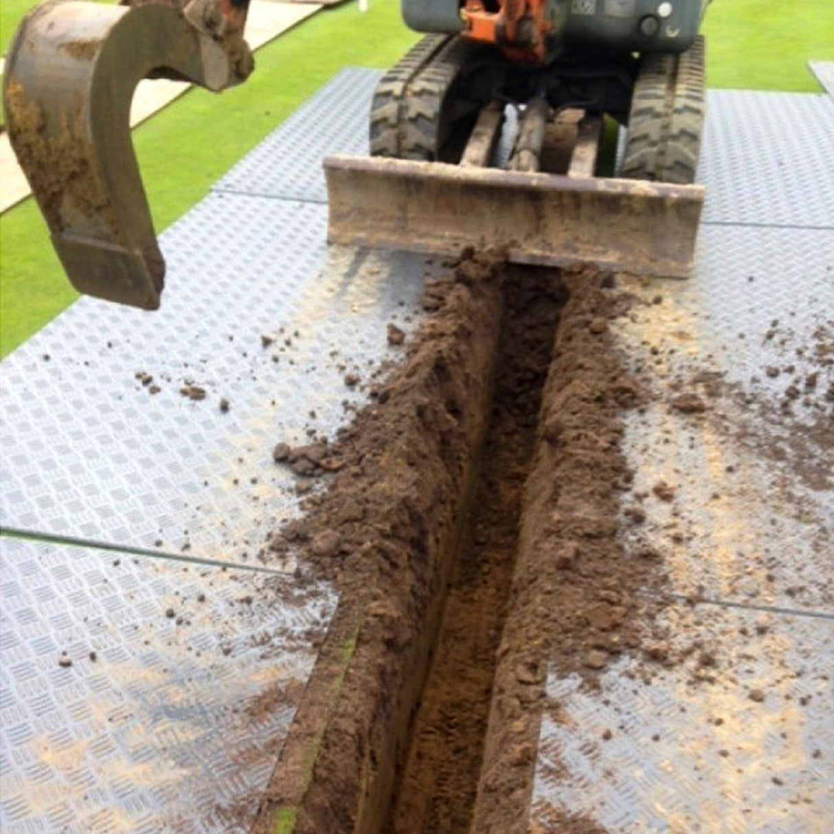 DuraMatt access mats laid alongside groundworks, close-up view