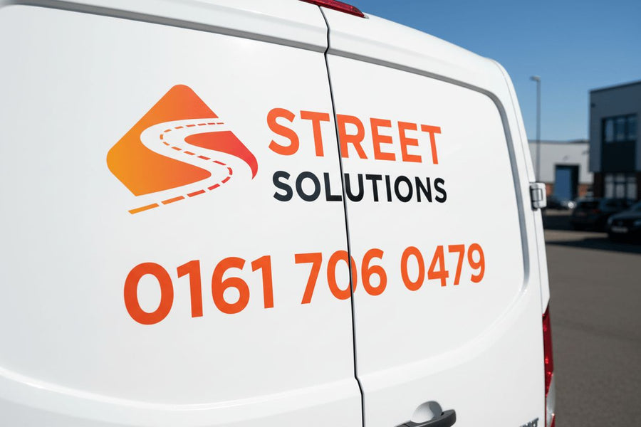 Street Solutions delivery van with the phone number on the rear doors