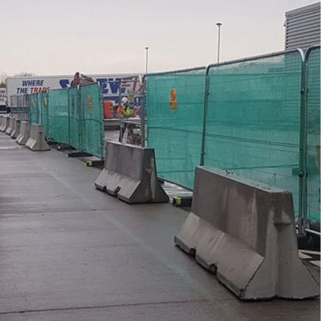 Traffic barriers, Road safety, Vehicle and pedestrian safety, Concrete barriers, Metal guardrails, Hazard prevention, Accident reduction, Pedestrian traffic, Bike lanes, Cost-effective installation, Maintenance, Road environments
