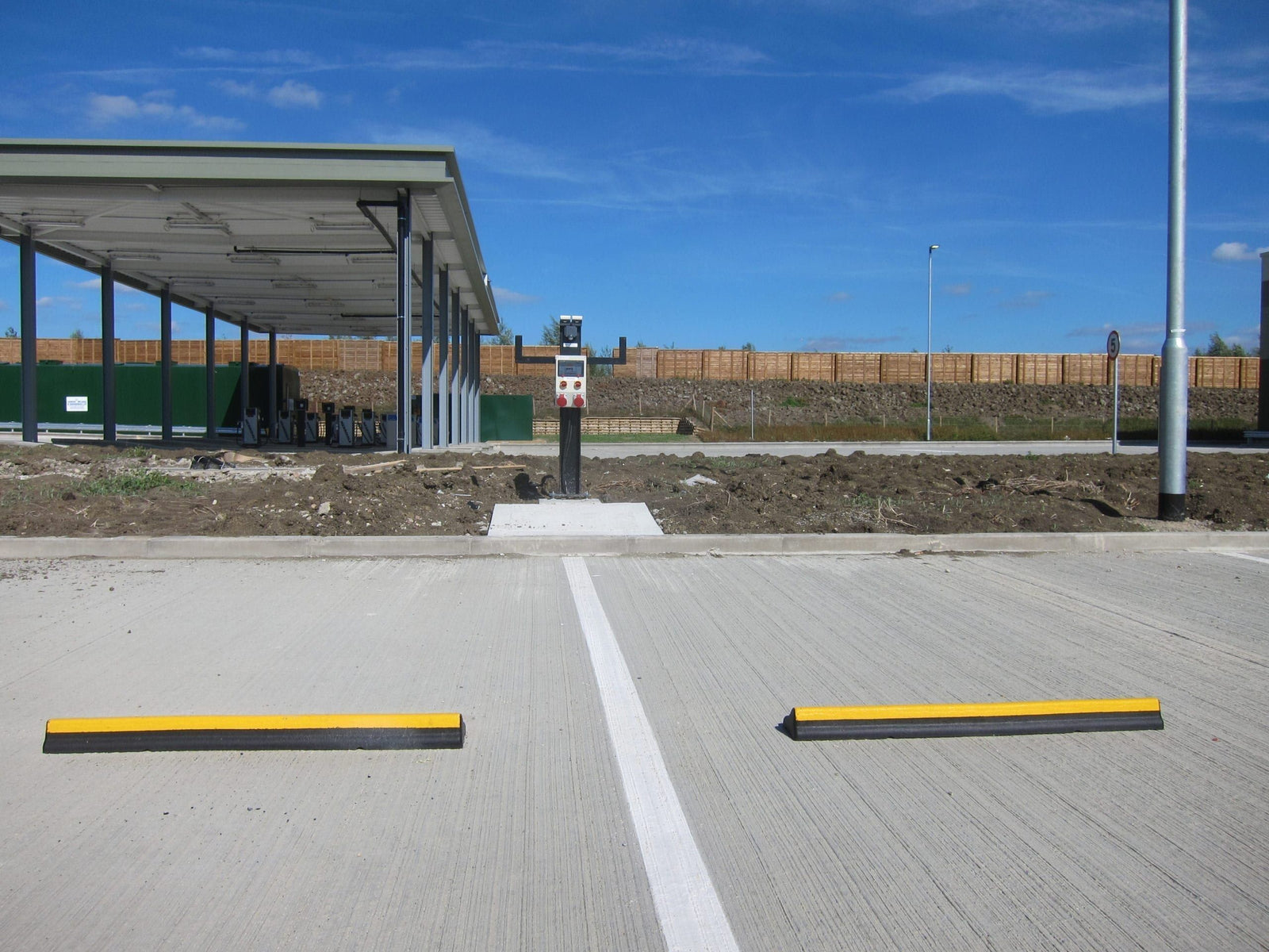 Car parking stops Wheel stoppers Rubber parking stops HGV stops Eco-friendly solutions Parking spaces Vehicle safety Pedestrian walkways Parking solutions Vehicle damage Efficient use of space Parking efficiency