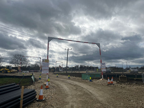 Intermodal terminal solutions Vehicle detection sensors Rail environment safety Traffic management systems Construction site security Height restriction technology Access control integration Construction site safety Traffic management plan