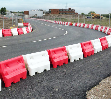Water filled barriers Road safety Traffic management Construction sites Event management Crowd control Temporary barriers Emergency response Flood protection Highway maintenance Barrier installation Barrier removal