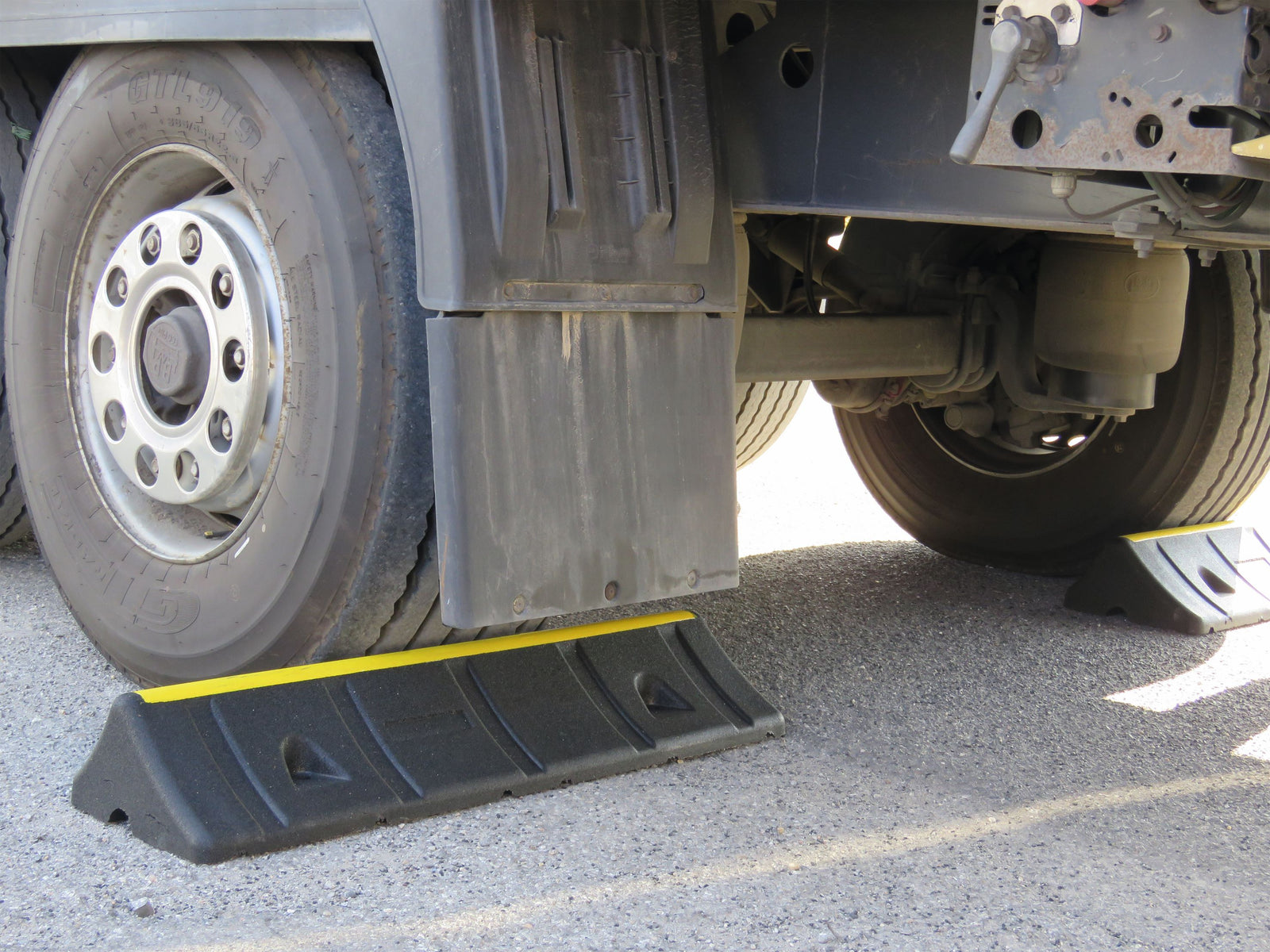 PVC car parking stops rubber parking stops cars vans rubber wheel stops HGV stop durable reliable pedestrian walkways parking management parking spaces eco-friendly wheel blocks parking space