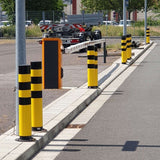 BLACK-BULL-FLEX-heavy-duty-top-grade-steel-bollard-ROOT-FIX-ADAPTER-CONCRETE-IN-galvanised-shock-absorbent-buffer-impact-resistent-powder-coated-yellow-black-industrial-durable-warehouses-factories-high-visibility-quality-TUV-tested-DGUV108007-surface-fix-bolt-down-concrete-in-ragged-concrete-filled