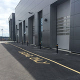 galvanised-steel-powder-coated-black-yellow-high-visibility-ornamental-outdoor-bollards-crash-protection-decorative-landscaping-safety-parking-posts-ornate-boundary-markers-warehouse-architechtural-car-showroom-shopping-mall-centres-car-parks-public-space-city-barriers-durable-weather-resistant