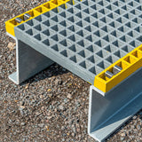 GRP-step-over-platform-glass-reinforced-plastic-walkway-access-industrial-site-safety-pipework-cables-high-visibility-free-standing-durable-lightweight-corrosion-resistant-fibreglass-warehouse-factory-flooring-construction-outdoor-indoor
