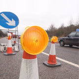 traffic-cone-lights-LED-flashing-road-safety-portable-warning-high-visibility-photocell-reflective-roadworks-unipart-dorman-waterproof-beacon-highway-outdoor-construction-nighttime-polycarbonate-orange-high-intensity-barrier-pedestrian-uk