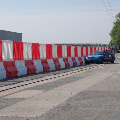 DEFENDER50 50mph Crash Tested Water-Filled Safety Barrier with Fence Panels