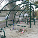 Heavy-duty kids scooter storage rack with welded hoops for cycle locks
