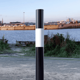 black-white-round-fixed-bollard-crash-impact-high-anti-ram-vehicle-safety-perimeter-security-crash-tested-heavy-duty-outdoor-street-furniture-pedestrian-modern-urban-public-space-carpark-building-protection-commercial-industrial