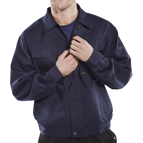 Heavyweight Drivers Jacket in Navy Blue, 9oz polyester-cotton blend, lay down collar, yoke back, multiple pockets, and elasticated waistband.