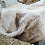 Discover our premium hessian roll, crafted from 100% natural and biodegradable materials, ideal for safeguarding mortar, brickwork, and concrete against harsh weather conditions. This versatile product, also known as Builders Hessian, offers breathability to allow for natural drying and ventilation.