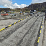 kerbeye-kerb-it-rubberised-kerbing-overlay-system-RKOS-high-visibility-durable-flexible-reflective-safety-kerbing-pavement-industrial-commercial-traffic-warehouses-construction-sites-damage-prevention-black-yellow-hi-viz