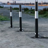 black-white-round-removable-bollard-crash-impact-high-anti-ram-vehicle-safety-perimeter-security-crash-tested-heavy-duty-outdoor-street-furniture-pedestrian-modern-urban-public-space-carpark-building-protection-commercial-industrial