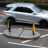 Versatile rubber traffic islands designed for keep-left signs and bollards.