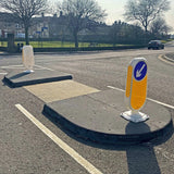 High-pressure moulded rubber traffic islands with universal sign fixing plate.