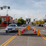 Durable rubber traffic islands with Heritage paver pattern option.