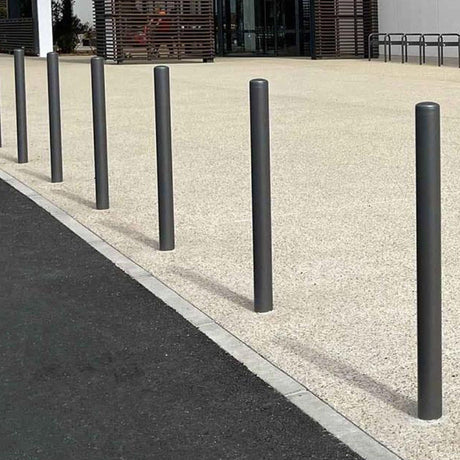 Painted-dome-top-steel-bollard-dome-top-bollard-painted-bollard-parking-lot-security-perimeter-protection-traffic-control-building-protection-pedestrian-safety-post-and-rail-durable-steel-red-outdoor-white-pedestrian-barricade