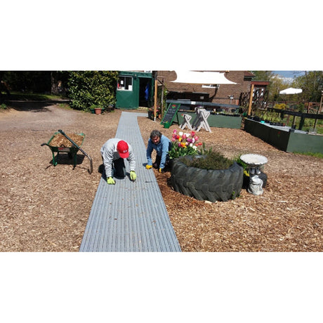 Portapath event flooring 80mm x 310mm x 16mm Lightweight flooring Temporary flooring solution Portable flooring Event flooring solution Heavy-duty flooring Outdoor flooring Ground protection Quick installation High traffic events